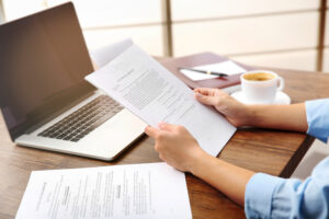 Lawyer sitting at the table with papers
