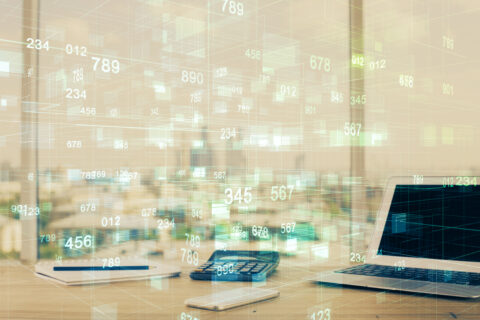 Double exposure of desktop computer and technology theme hologram. Concept of software development.