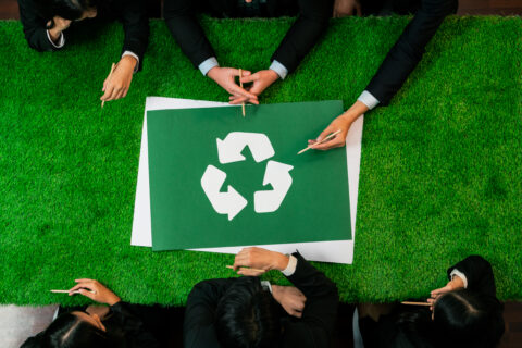 Top view panorama banner recycle icon on meeting table in office with business people planning eco business investment on waste management as recycle reduce reuse concept for clean ecosystem.