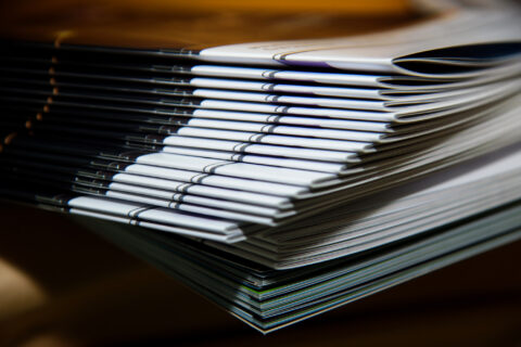A stack of folded booklets