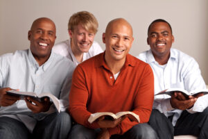 Diverse group of men studying together