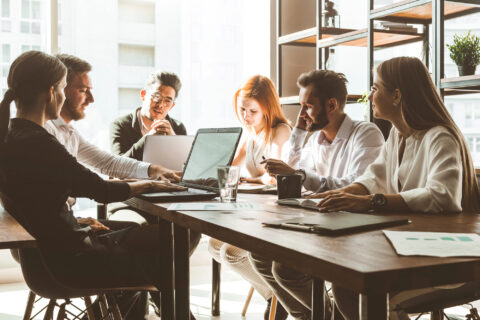 Group meeting at office conference table