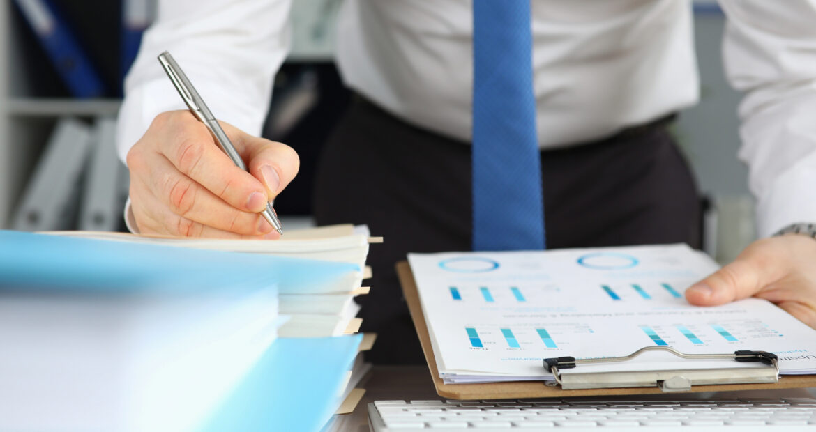 Businessman consulting lawyer, signing contract agreement.